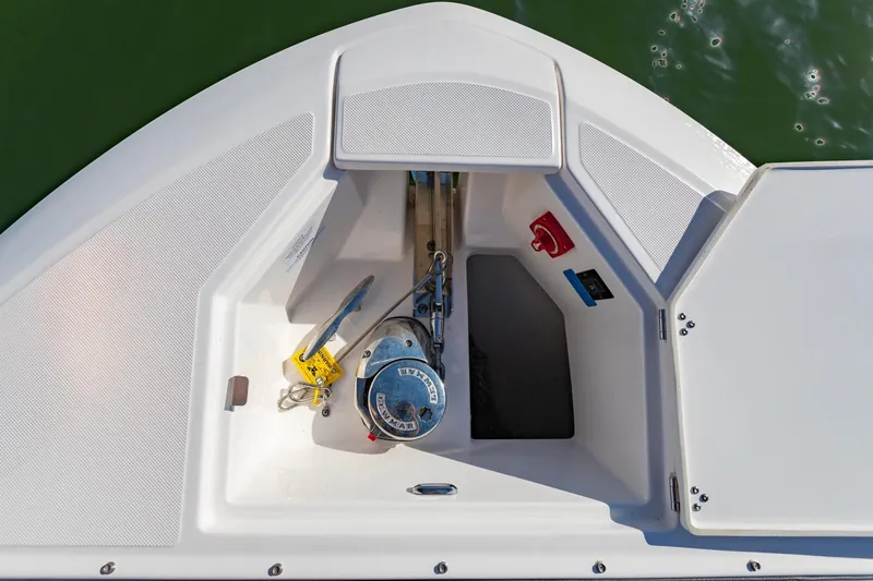 The Big Dill Yacht Photos Pics 2023 Regal LS36 boat anchor compartment with winch and safety equipment.