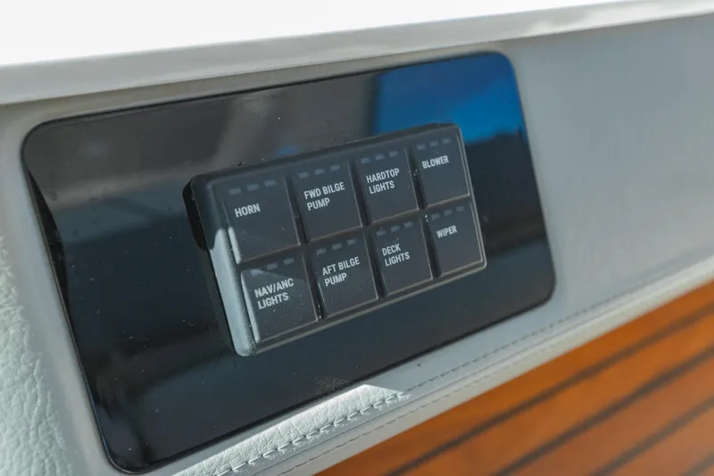The Big Dill Yacht Photos Pics Control panel of 2023 Regal LS36 boat with labeled switches.