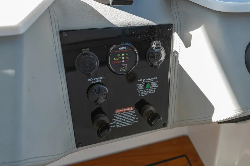 The Big Dill Yacht Photos Pics Control panel of 2023 Regal LS36 boat featuring high water alarm and fire extinguisher indicators.
