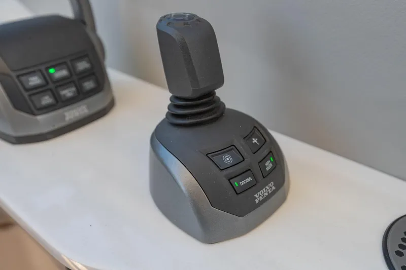 The Big Dill Yacht Photos Pics Joystick control system on 2023 Regal LS36 boat, featuring Volvo Penta technology.