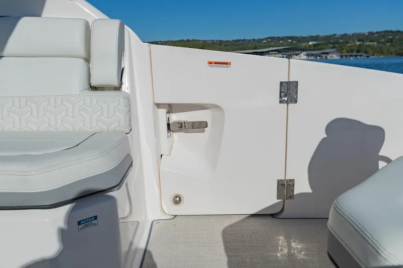 The Big Dill Yacht Photos Pics 2023 Regal LS36 boat interior with white seating and sleek design.