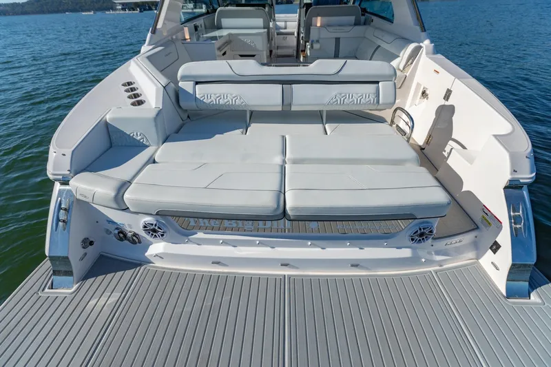 The Big Dill Yacht Photos Pics 2023 Regal LS36 boat with spacious rear seating and luxurious design on water.