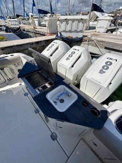  Yacht Photos Pics Boston Whaler 365 Conquest 2025 with triple outboard engines and onboard sink.