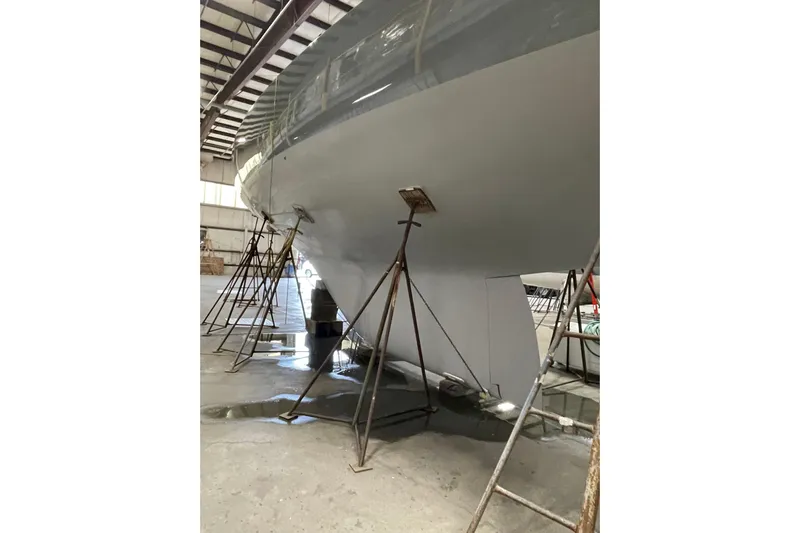 Enterprise Yacht Photos Pics 1997 Sparkman & Stephens 12M yacht in dry dock, supported by stands.