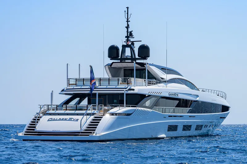 Goldeneye Yacht Photos Pics Luxury 2020 Mangusta 54 Gransport yacht on open sea, rear view.