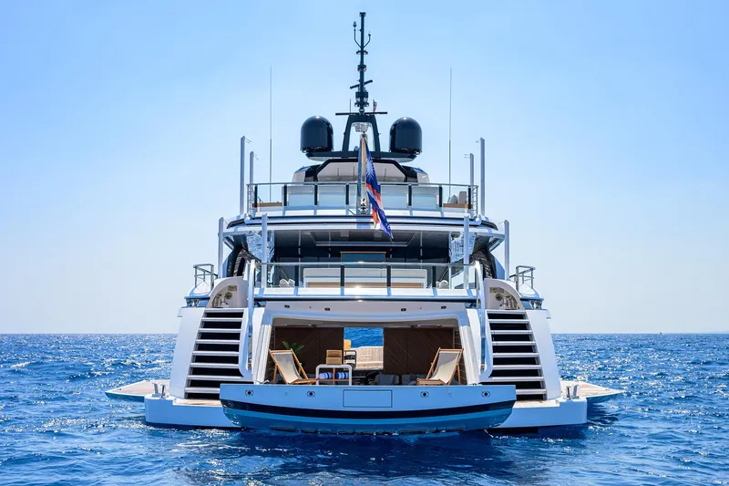 Goldeneye Yacht Photos Pics Luxury 2020 Mangusta 54 Gransport yacht on open sea, rear view.