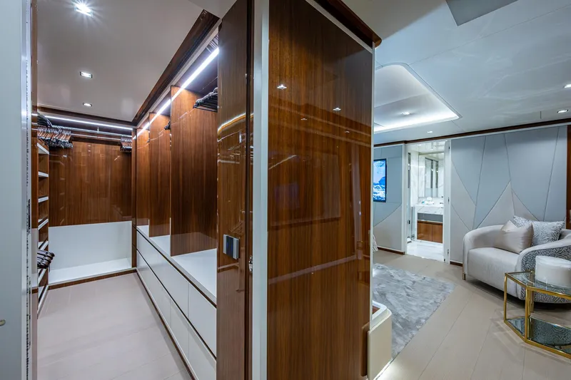 Goldeneye Yacht Photos Pics Luxurious interior of 2020 Mangusta 54 Gransport yacht with elegant wood finishes and modern design.