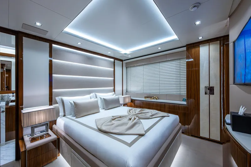 Goldeneye Yacht Photos Pics Luxurious bedroom interior of 2020 Mangusta 54 Gransport yacht with modern design.