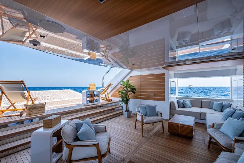 Goldeneye Yacht Photos Pics Luxurious interior of 2020 Mangusta 54 Gransport yacht with ocean view.