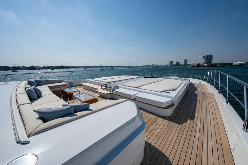 Goldeneye Yacht Photos Pics Luxurious 2020 Mangusta 54 Gransport yacht deck with elegant seating and ocean view.