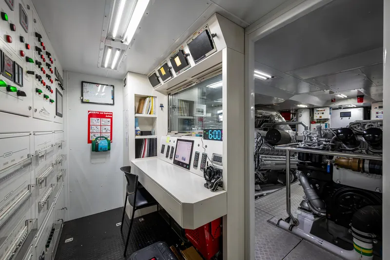 Goldeneye Yacht Photos Pics Control room and engine area of 2020 Mangusta 54 Gransport yacht, featuring modern equipment.