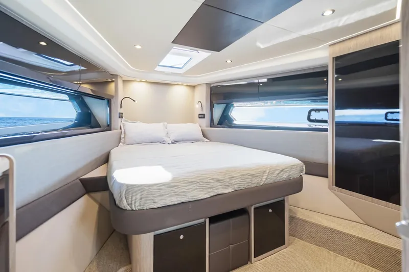  Yacht Photos Pics Luxurious bedroom interior of 2021 Azimut Atlantis 51 yacht with modern design.