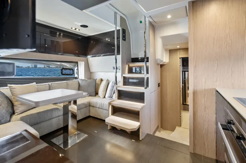  Yacht Photos Pics Luxurious interior of 2021 Azimut Atlantis 51 yacht with modern seating and elegant design.