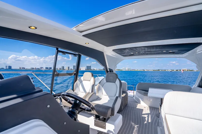  Yacht Photos Pics Luxurious 2021 Azimut Atlantis 51 yacht interior with ocean view and modern seating.