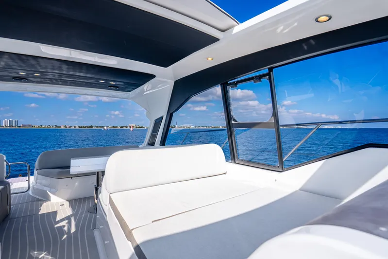  Yacht Photos Pics Luxurious interior of 2021 Azimut Atlantis 51 yacht with ocean view.