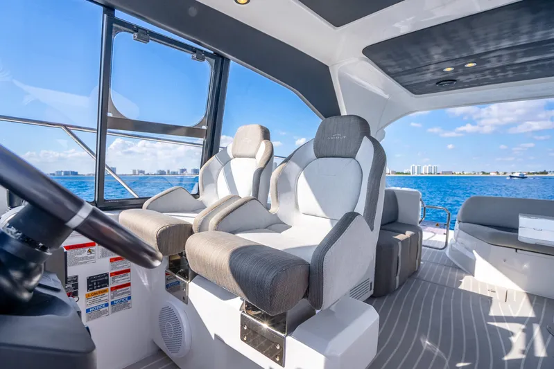  Yacht Photos Pics Interior of 2021 Azimut Atlantis 51 yacht with luxurious seating and ocean view.