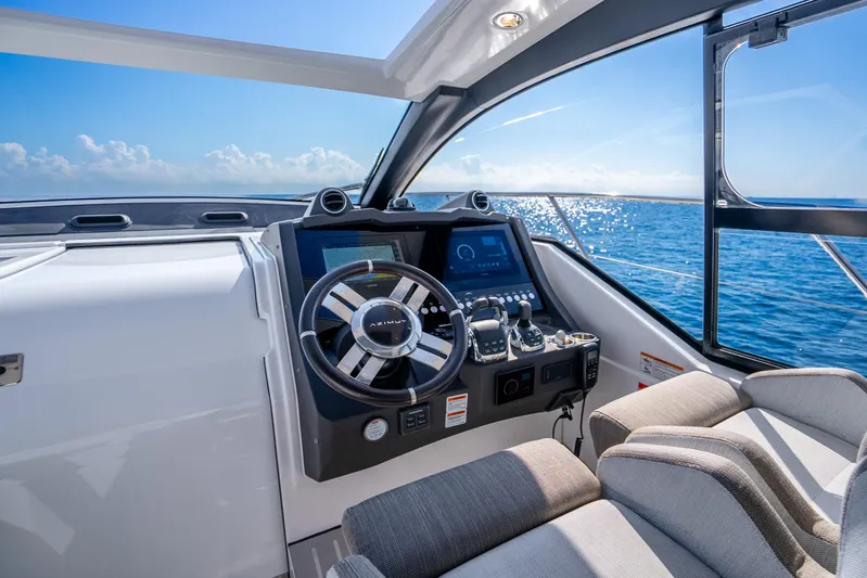  Yacht Photos Pics Helm of 2021 Azimut Atlantis 51 yacht with ocean view.