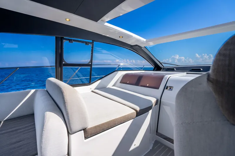  Yacht Photos Pics Interior view of 2021 Azimut Atlantis 51 yacht with ocean backdrop.