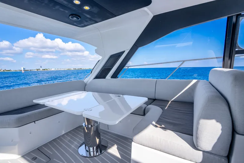  Yacht Photos Pics Luxurious interior of 2021 Azimut Atlantis 51 yacht with ocean view.