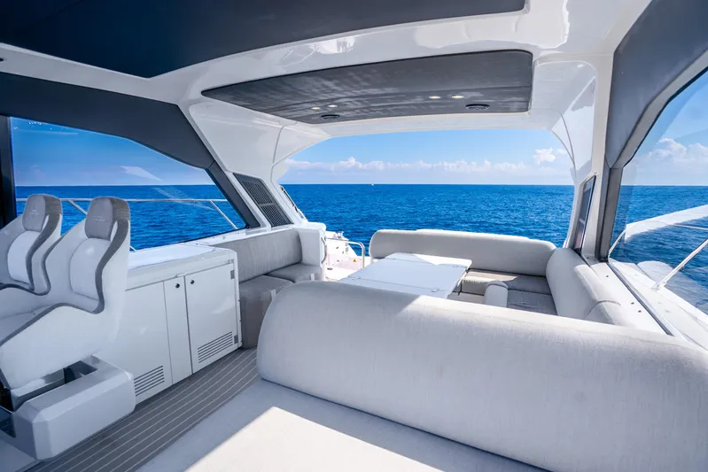 Yacht Photos Pics Luxurious interior of 2021 Azimut Atlantis 51 yacht with ocean view.