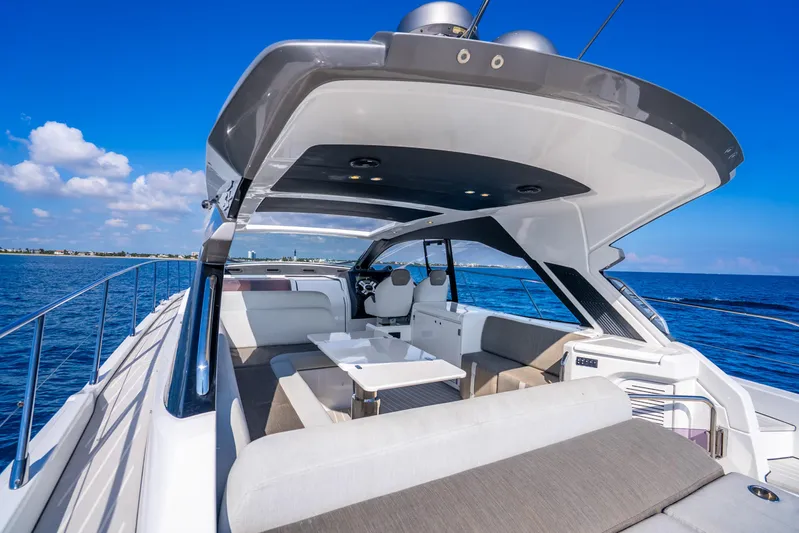  Yacht Photos Pics Luxurious 2021 Azimut Atlantis 51 yacht with spacious deck and modern design on open sea.