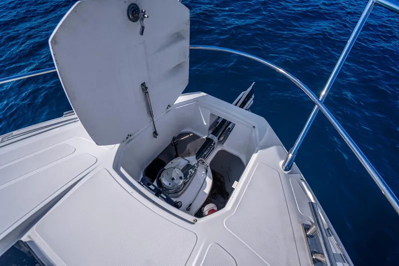  Yacht Photos Pics Open anchor compartment on 2021 Azimut Atlantis 51 yacht, with ocean backdrop.