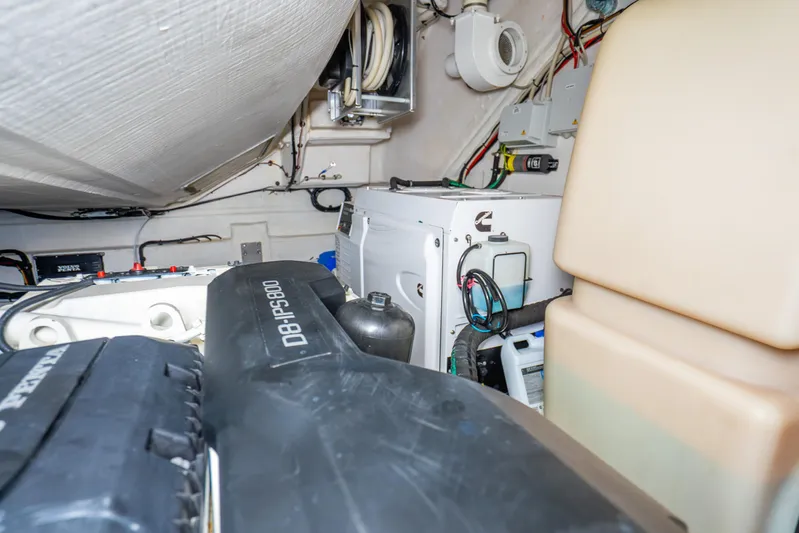  Yacht Photos Pics Engine room of 2021 Azimut Atlantis 51 yacht, showcasing mechanical components and wiring.