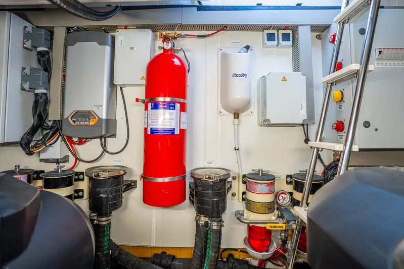  Yacht Photos Pics Engine room of 2021 Azimut Atlantis 51 yacht with safety equipment and control systems.