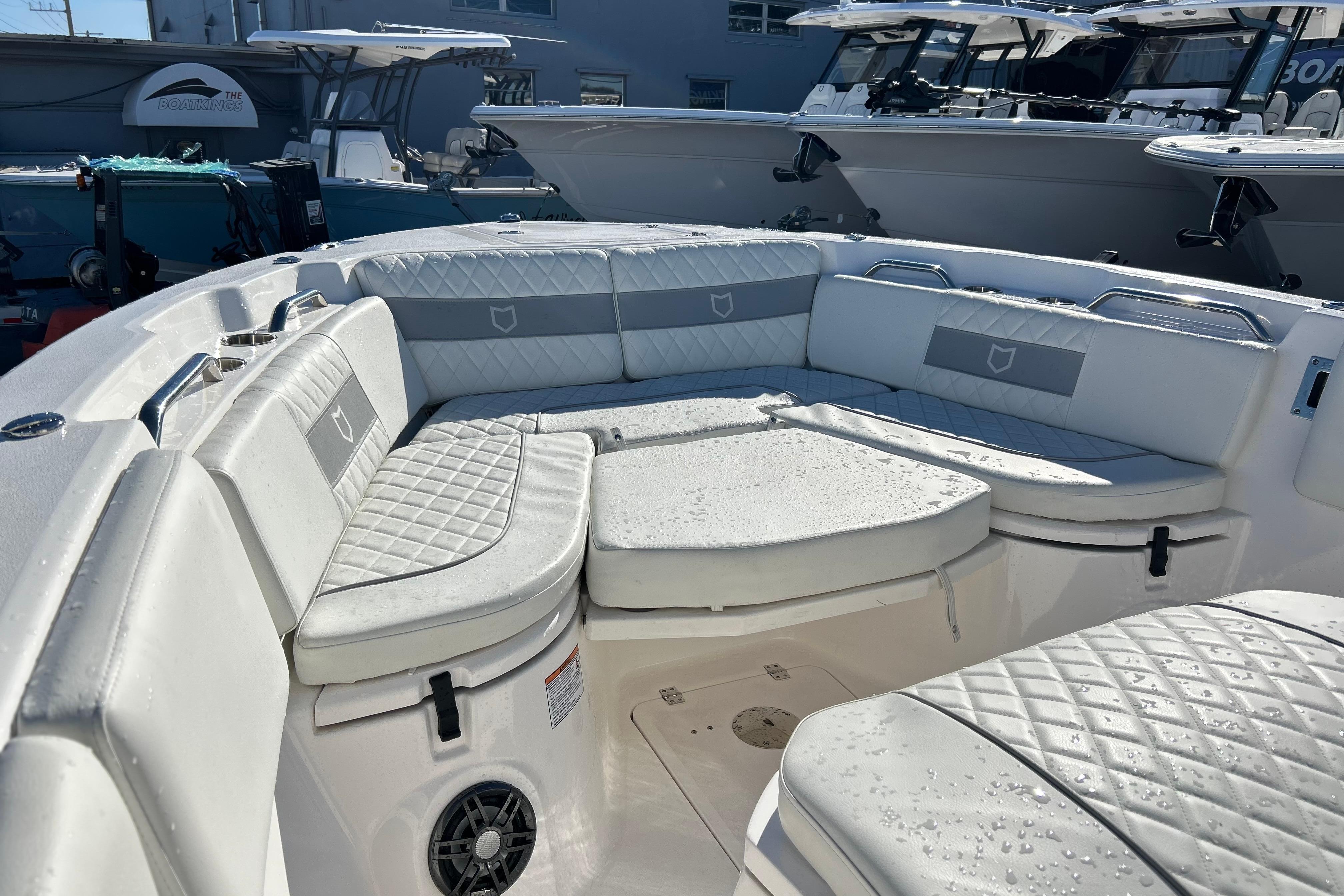 2024 Sea Fox 268 Commander boat interior with white cushioned seating.