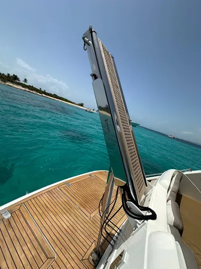  Yacht Photos Pics Fairline Squadron 58 yacht deck, 2006 model, with turquoise ocean backdrop.