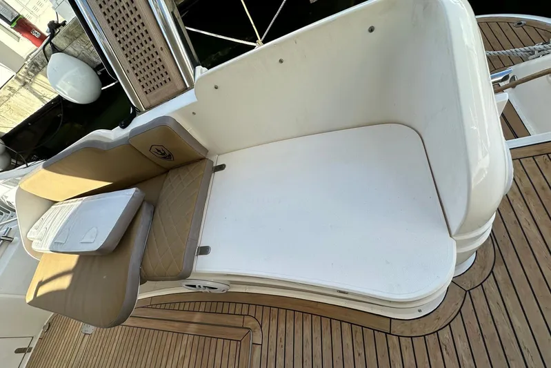  Yacht Photos Pics Fairline Squadron 58 yacht's deck seating area, 2006 model, with wooden flooring.
