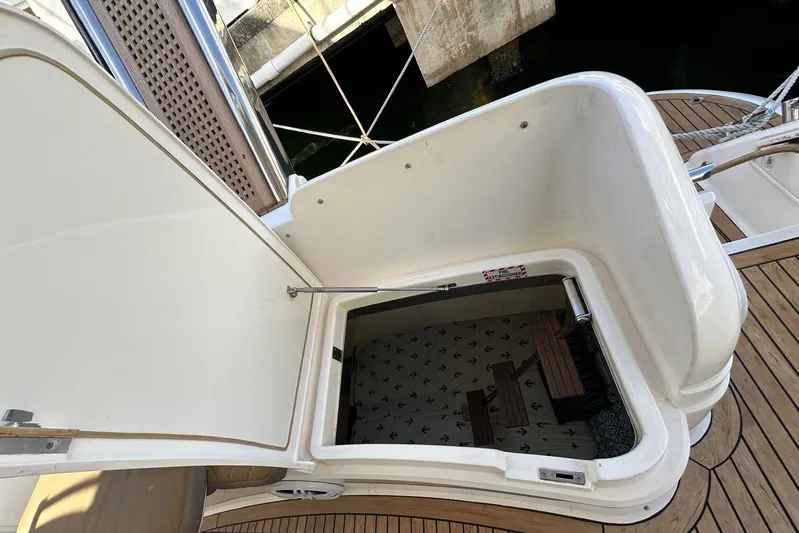  Yacht Photos Pics Open hatch on 2006 Fairline Squadron 58 yacht, revealing interior access.