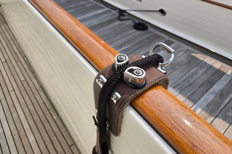 Wa Yacht Photos Pics Close-up of a 2012 Beneteau Swift Trawler 52 deck with rope and hardware.