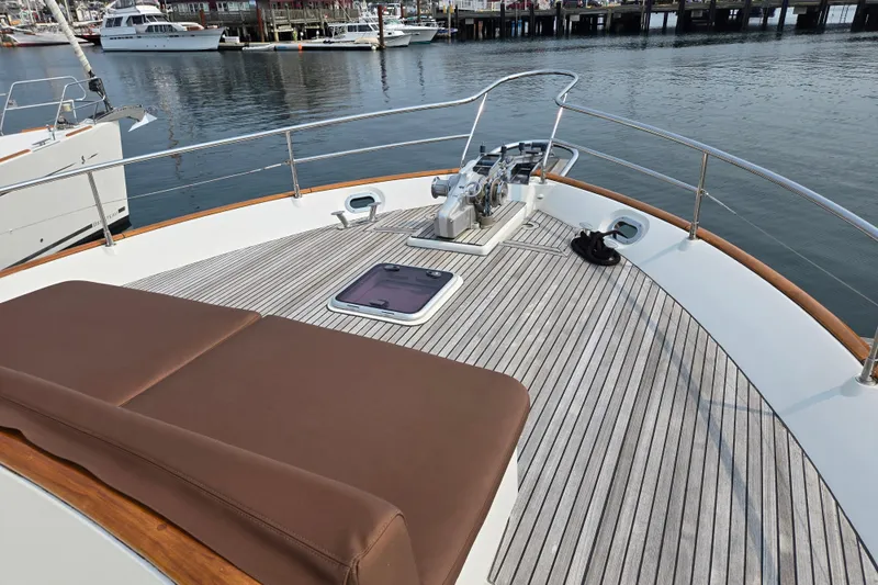 Wa Yacht Photos Pics Bow view of 2012 Beneteau Swift Trawler 52 with teak deck and seating.