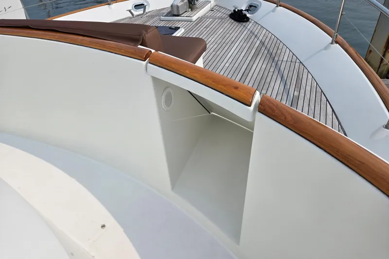 Wa Yacht Photos Pics 2012 Beneteau Swift Trawler 52 deck with wood accents and seating area.