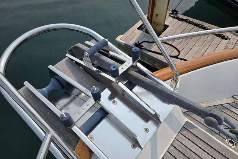 Wa Yacht Photos Pics Anchor system on 2012 Beneteau Swift Trawler 52, docked with wooden deck.