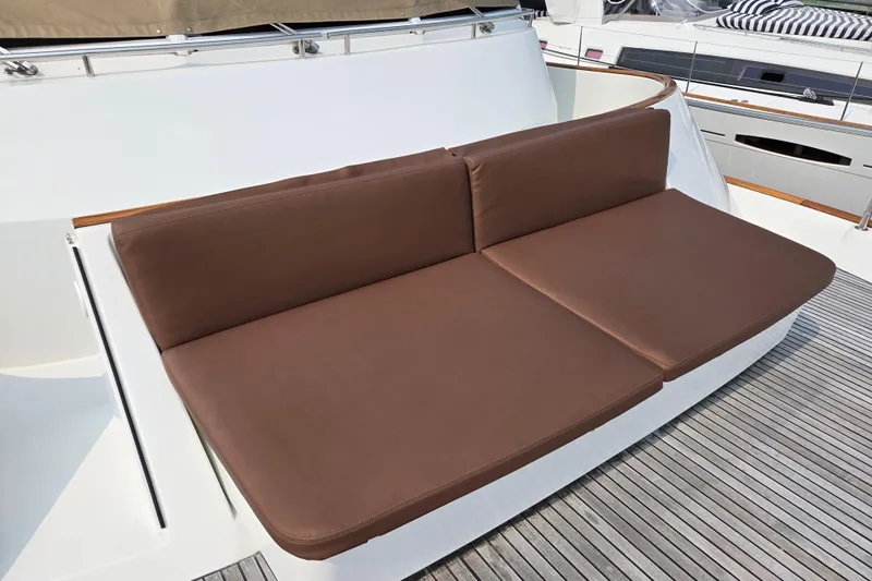 Wa Yacht Photos Pics Brown cushioned seating on 2012 Beneteau Swift Trawler 52 yacht deck.