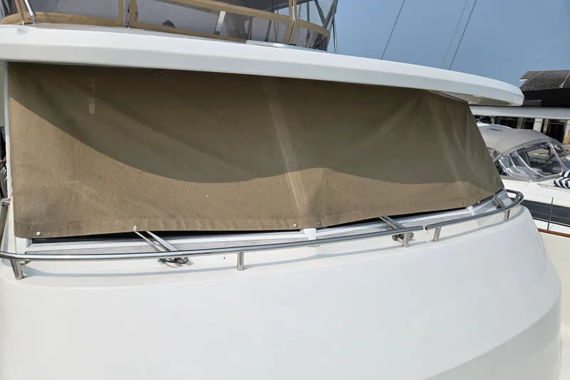 Wa Yacht Photos Pics 2012 Beneteau Swift Trawler 52 with covered front window, docked at marina.