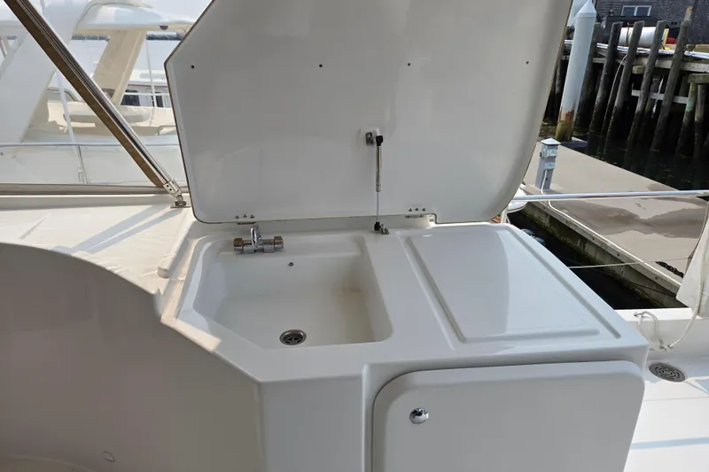 Wa Yacht Photos Pics Outdoor sink on 2012 Beneteau Swift Trawler 52 yacht, docked at marina.
