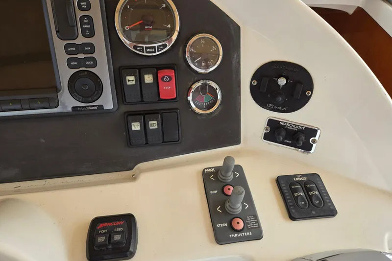 Wa Yacht Photos Pics Control panel of a 2012 Beneteau Swift Trawler 52 with various switches and gauges.