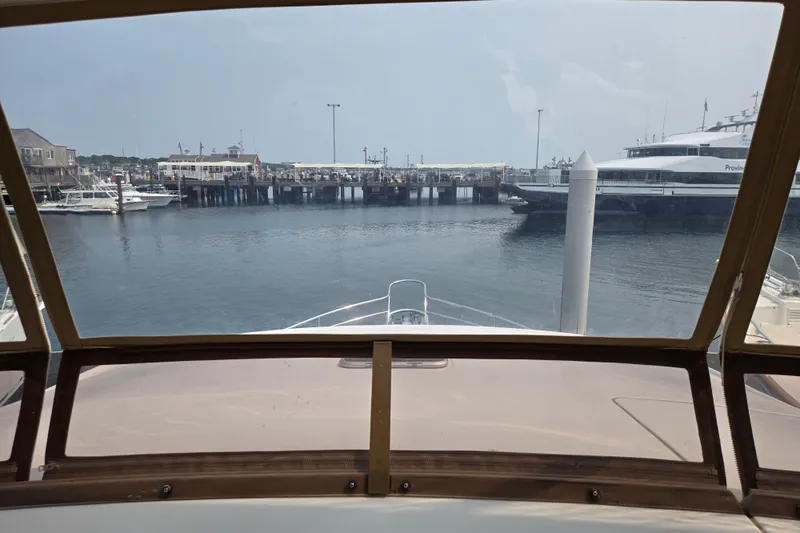 Wa Yacht Photos Pics View from 2012 Beneteau Swift Trawler 52, overlooking marina and docked boats.