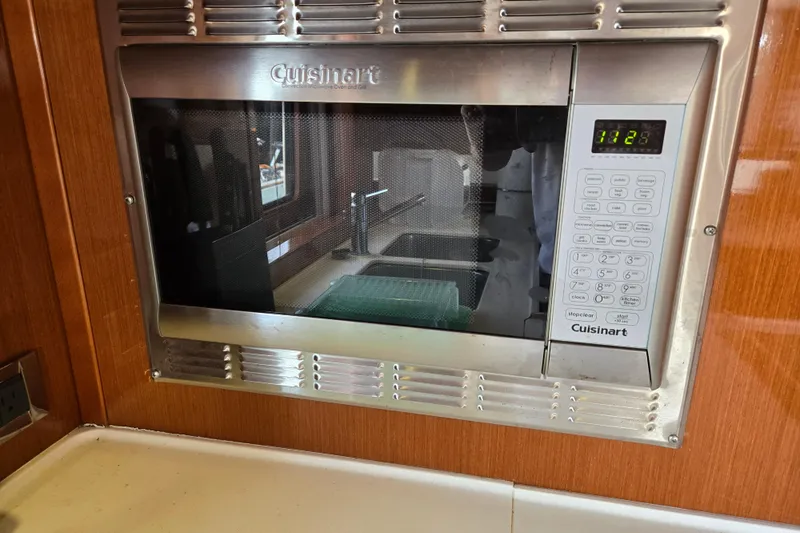 Wa Yacht Photos Pics Built-in Cuisinart microwave in 2012 Beneteau Swift Trawler 52 kitchen area.