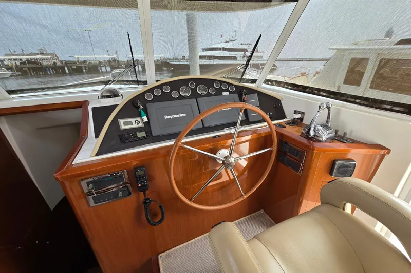 Wa Yacht Photos Pics Helm of 2012 Beneteau Swift Trawler 52 with Raymarine navigation system.