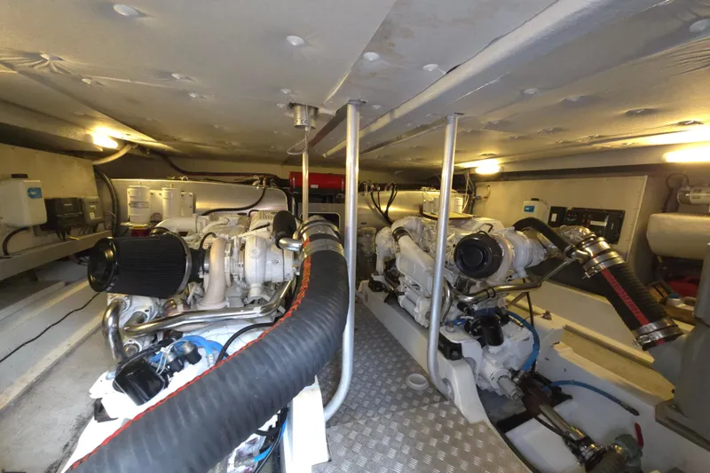 Wa Yacht Photos Pics Engine room of 2012 Beneteau Swift Trawler 52 with dual engines and mechanical components.