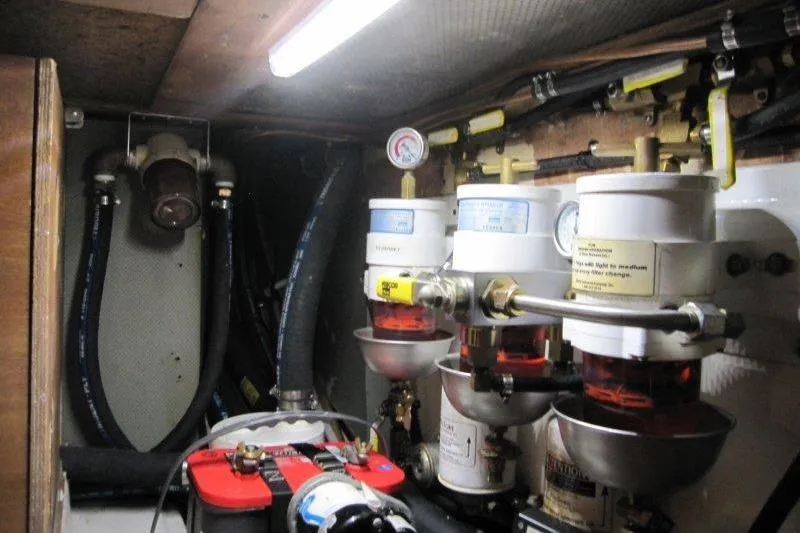 Bella Yacht Photos Pics Engine room of 1983 Nauticat 43 yacht with fuel filters and battery.