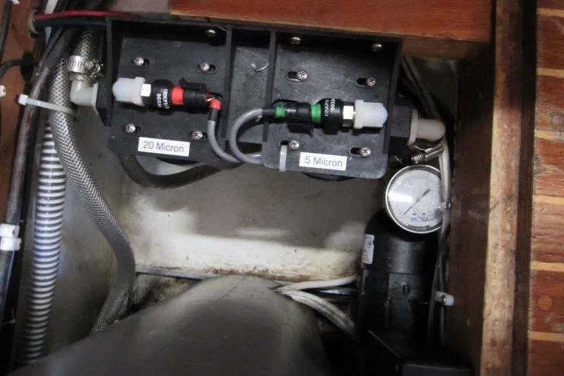 Bella Yacht Photos Pics Engine compartment of 1983 Nauticat 43 with 20 and 5 micron filters.