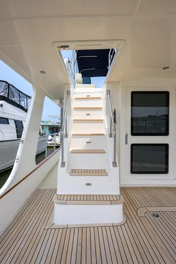 Teal Aweigh Yacht Photos Pics Staircase on 2011 Grand Banks 41 Europa yacht with teak decking.