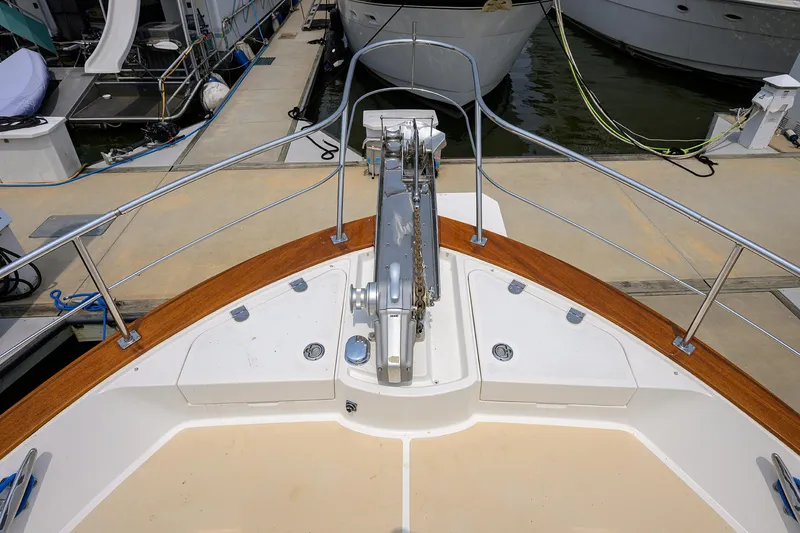 Teal Aweigh Yacht Photos Pics Bow view of 2011 Grand Banks 41 Europa yacht at dock.