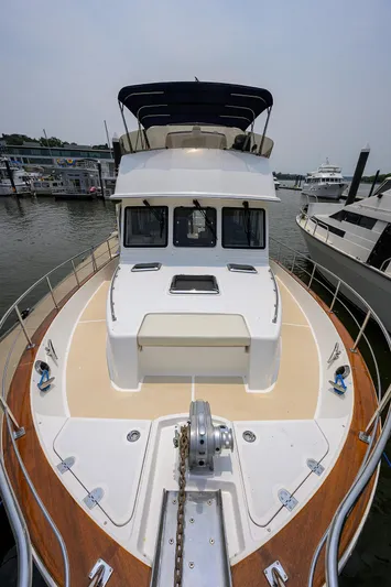 Teal Aweigh Yacht Photos Pics 2011 Grand Banks 41 Europa yacht docked at marina, front view.