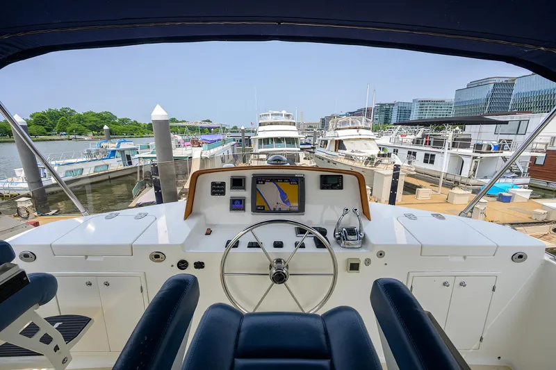 Teal Aweigh Yacht Photos Pics Helm of 2011 Grand Banks 41 Europa yacht docked at marina.